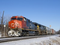 CN 2618 & CSXT 460 lead a 113-car CN 377 past MP 22 of CN's Kingston Sub on a crystal clear, but frigid afternoon.