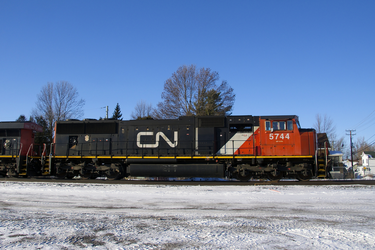 CN 5744 is the lead unit on CN 310 as it passes through Coteau.