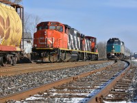 CN L540 waits for VIA 85 to clear Hanlon so they can get the light to run around their train and proceed West back to Kitchener. I don't think this scene could get anymore Canadian... well maybe the Rockies