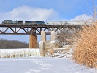 A frozen blue devil, as us younger guys call it, crosses the Grand River for work at Paris. On a predicted completely cloudy day, the appearance of the sun for all but 1 of our 5 or so shots was a nice surprise!