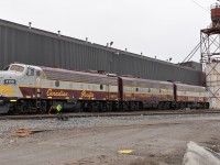 Canadian Pacific EMD FP9A's 4106 and 4107 lashed together with F9B 1900 in the middle outside the locomotive shop in Ogden Yard,Calgary