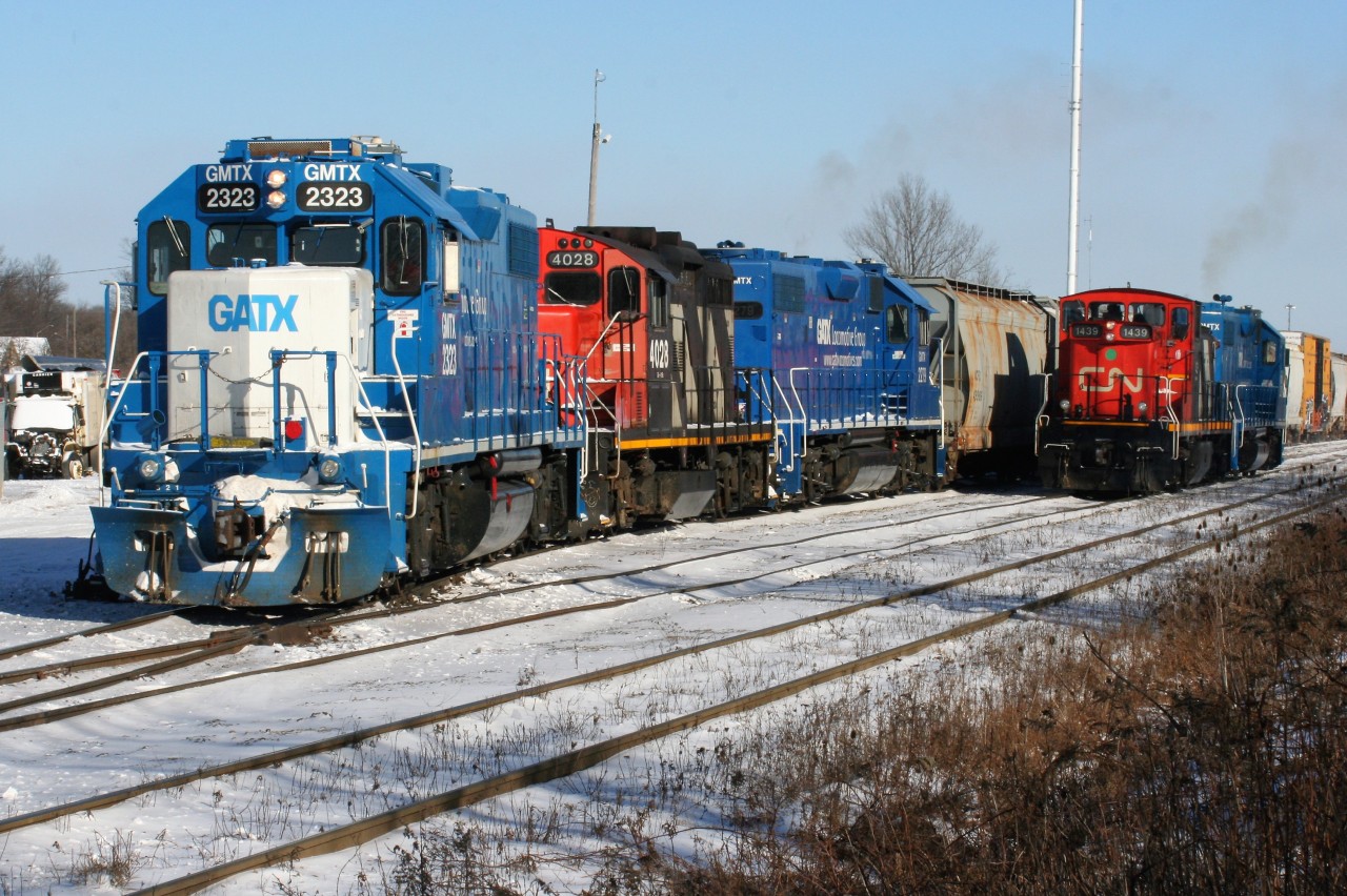 With CN having taken-back operations of the Guelph Subdivision over two months ago, the motive-power operating on jobs has almost had a retro feel amongst the modern-painted GMTX four-axle power assigned. Era's collide at Kitchener yard on the coldest day of 2019 so far, as train L568 departs on the left for Stratford with GMTX 2323, CN 4028 and GMTX 2279 as train L540 waits in the siding with CN 1439 and GMTX 2289 after returning from Guelph.