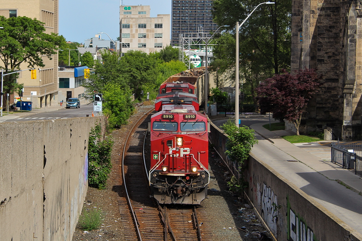 I can't say I ever shoot much on the CP mainline, mostly because activity is infrequent and the power is usually mundane. I did however want to get a shot of a train coming into the Hunter Street tunnel and a train coming out of the tunnel, and I managed to do both on June 10. Here, 8910 leads 255 into the tunnel with the former TH&B Station in the background. I find it hard to believe this tunnel used to be double track. Sure would have been fun to watch the TH&B geeps ply these rails.