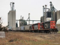 Here we have CN L514 on their weekly Saturday run down to Blenheim via the Sarnia Spur/Blenheim Industrial. Today on point were two of the classic GP9Rm's. CN 7025, and 4130. In this shot they have completed their work at Thompson's and are preparing to make their way to Thamesville on the CN Chatham Sub. On this day they were also to have work ADM on the north side of the tracks, but due to the blue flag being left up on ADM's siding and no one around to remove it unfortunately ADM would be passed up and have to be switched out on the next trip. Rumor's are abound that the future of the spur(s) in up in the air but only time will tell as the number of cars coming and going seems to be keeping steady or increasing for now.  