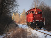 Westward Ho! OSR's Tillsonburg job has begun their day. Here they are with a pair of former CP SW1200RS' headed light power down the St.Thomas sub at Five Points Road near Putnam, Ontario. From here they will head into the CN Yard at St.Thomas, tie onto their train for the day and head east on the CN Cayuga Spur for Tillsonburg. 