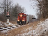 Next Stop Tillsonburg! With 1210 in the lead the OSR Tillsonburg Job crosses Green Line with their train in tow just west of the yard at Tillsonburg.