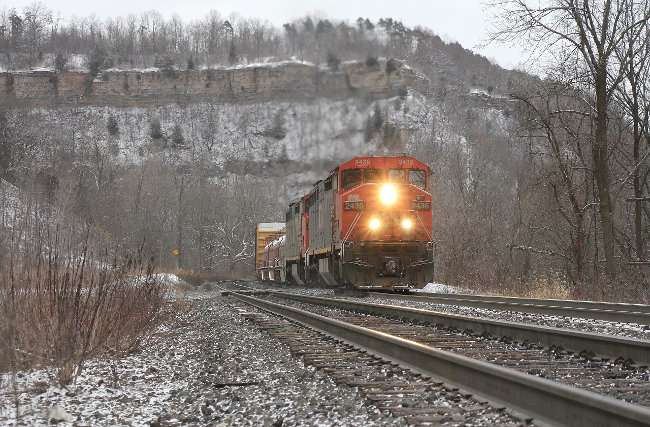 CN 331 works up the grade at Dundas with a pair of "old units" as described by the crew. The train later stalled out bringing them into Brantford after dark.