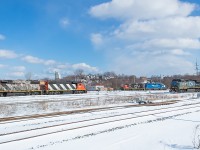 More snow fell last night, making for the second Sunday in a row with fresh snow and nice sunny skies. Before entering the yard, 331 spoke with the trainmaster to make sure the yard crews were out of the way. Lucky for me, the one crew on duty at the time was having their lunch and their power (4781 and 4713) was tied down allowing for this shot. 330 and 331 seem to be pretty reliable for having interesting power.