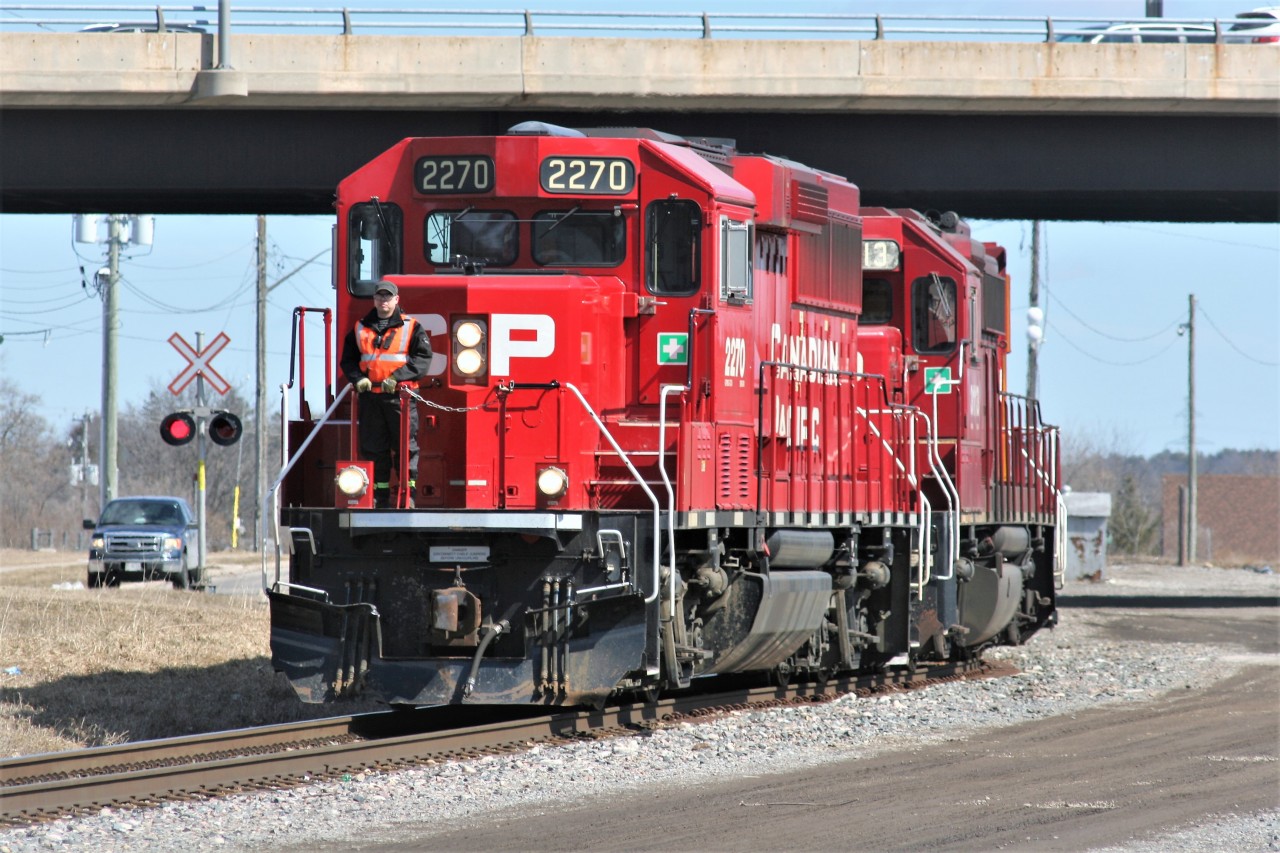 CP 2270, 3113 and 2263 slowly head towards the Galt Subdivision mainline and their train after completing their work at Galt on a late winter afternoon.