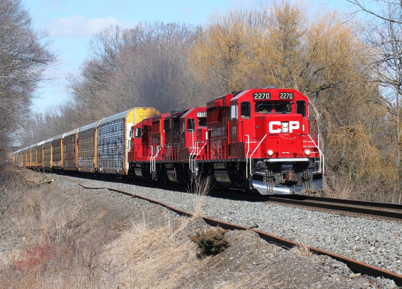 The Wolverton Turn with 2270, 3113 and 2263 are making easy work of famed Orrs Lake hill, west of Galt, Ontario on the Galt Subdivision as they head westward towards their home base of Wolverton yard.