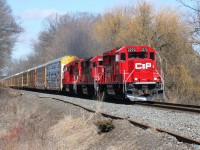 The Wolverton Turn with 2270, 3113 and 2263 are making easy work of famed Orrs Lake hill, west of Galt, Ontario on the Galt Subdivision as they head westward towards their home base of Wolverton yard. 