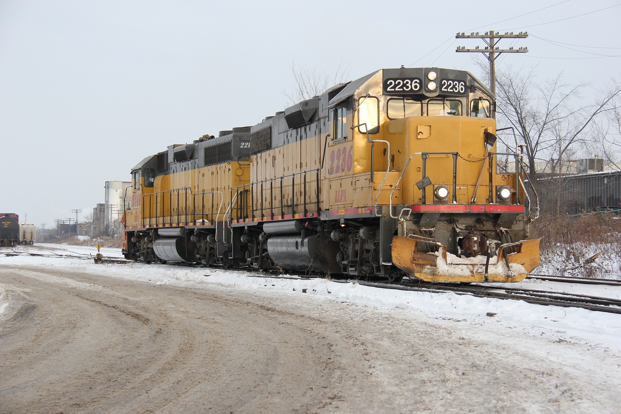 Approximately four years ago, GEXR is observed switching the Kitchener yard with matching LLPX units (2236 and 2210). I do not recall the train symbol but it was likely 580 switching based on the time of day. The snow and cold that season were really starting to set in at this point. A few weeks after this image was taken, was the last time a "true" snowstorm hit the K-W area.