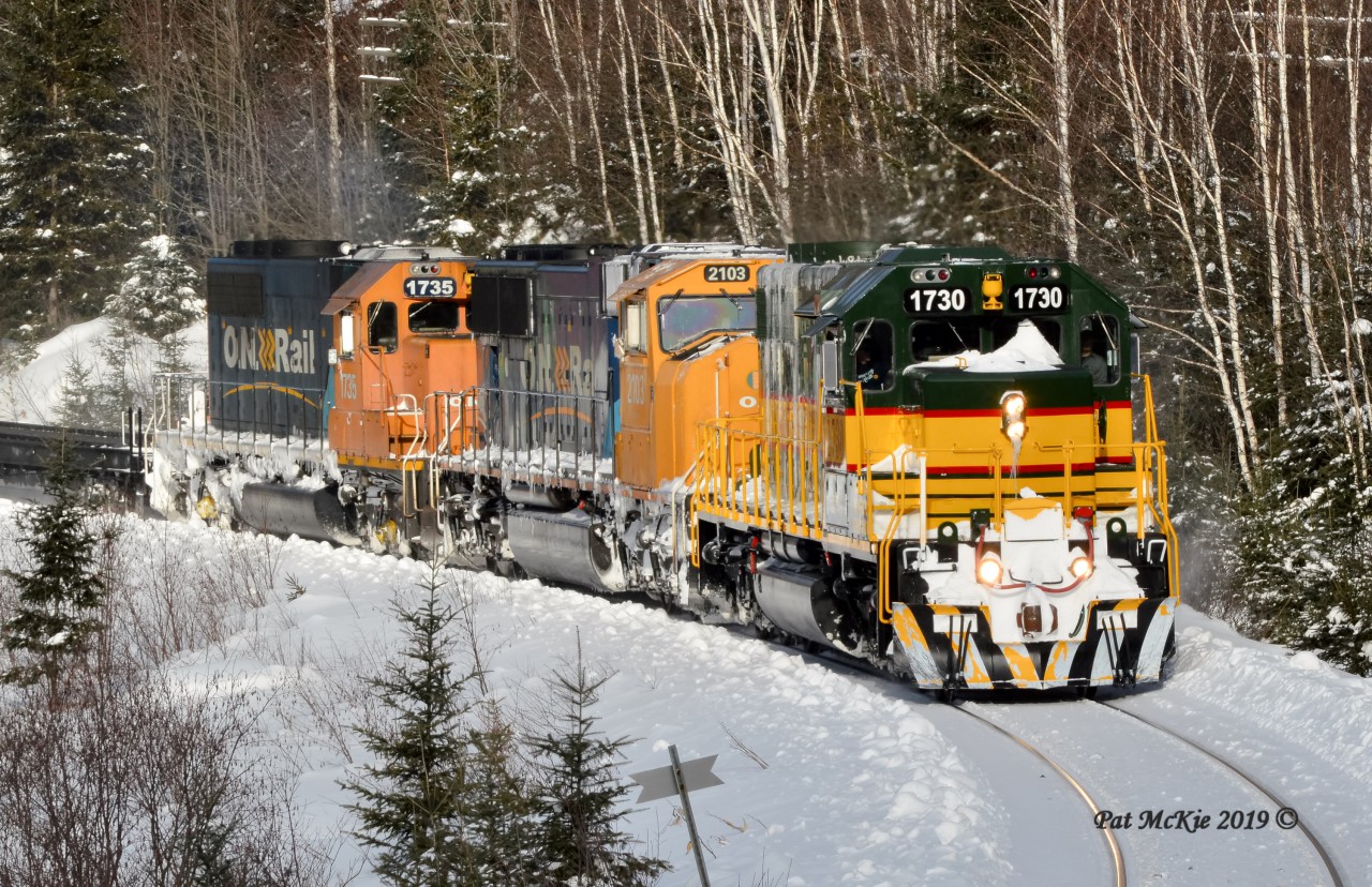 Hauling her first south bound train in the heritage paint scheme, ONT 1730 heads past mile 11.7 of the Temagami sub January 10th 2019
