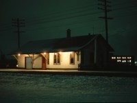 When I was a lot younger and more cold-resistant, I'd head out on week nights, after my girlfriend kicked me out, to do night photos.  This is the former Canadian Northern station at North Edmonton.  It is on the line that went from downtown out o the Vegreville subdivision.  Off to the right was a diamond crossing over the CN main line (ex-GTP).  I am not sure when this station was torn down.  The diamond is gone and this line was replaced by LRT train tracks that tunnel under the CN main.  The faint lighting on the snow in the foreground was from the headlight of train # 2, the "Supercontinental".  Hope all the station foamers like this!