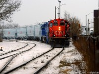 The 0700 yard job is lifting National Steel Car, and in tow, are what may be the first new CN grain hoppers coming out of the plant. These will replace the current fleet of colourful cylindrical hoppers.. get 'em while you can, because this is the future of our grain trains on CN.