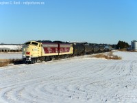 My annual trip to see action on the St. Thomas sub, which for the last few years has featured a pair of F units. You just can't go wrong with OSR. I was hopeful for some snow action, but there was almost none to be had save for a few road plow drifts. I have to take a day off work for this annual trip, and each year i'd get something different. Now we have a matching pair of FP9A's. You know what? I think the OSR colours really show nicely in winter, despite the plain nose of 1401/6508 it really pops. I also enjoy how the tilling of the farmers fields forms a nice pattern in the snow. With thanks to the boys for the friendliness and the show, I promised I'd post something today, there's much more to come, I had a great and productive day. :) This is approaching Ferguson line not too far from St. Thomas city limits.