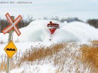 Where's winter? At least, in Southern Ontario - we're asking this question - as of January 9 it's yet to really arrive. Exactly one year ago, winter was in full blast mode and I had the pleasure of photographing <a href=http://www.railpictures.ca/?attachment_id=35914 target=_blank> GEXR battling snow in the morning to Goderich </a> only to get a call about OSR doing the same thing. A Doubleshot? Pinch me. I made sure to pinch myself and booked it for Salford to get at least one shot of OSR - I only needed one. This is it. The plow broke after this shot was taken and needed repair, but my mission was accomplished. <br><br>
Five years ago today, I also had the pleasure of a doubleshot - OSR called a plow for 0800 out of Salford, so I spent a  <a href=http://www.railpictures.ca/?attachment_id=12926 target=_blank> gorgeous kodachrome morning photographing OSR </a> and afterwards I went home via Stratford, the long way, because I heard a plow may be out on GEXR. I got lucky - they still hadn't  <a href=http://www.railpictures.ca/?attachment_id=12924 target=_blank>plowed the Guelph sub.</a> It will be interesting to see what CN does this winter in the St. Marys area, CN does have spreaders in the area - anyone know if CN has wedge plows in service or stored anywhere?. Both GEXR and OSR Still have their plows, crossing fingers they will have to pull it out and use it, if lucky, maybe on the same day. 