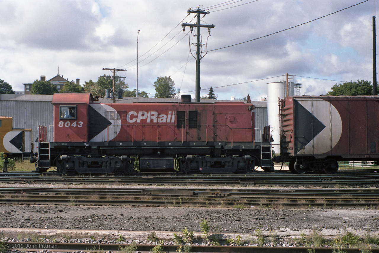 Visiting Trois-Rivieres station in June 1980, about 9 years after my family moved back to Ontario, some things were much as before:  
- A single RS-23 CP 8043 works the yard - the most frequently seen yard switcher type when I lived there.  
- The station looked the same, except the out-of-service centre platform was crumbling. 
- The track configuration at the station seemed unchanged. 
- The pipe handrails at the edge of the underpass (under boxcar) look familiar, as does the power line, and the vertical cylinder fuel tank.  
The differences were profound.  The residential/commercial area on the far side of the tracks had disappeared, replaced by a high concrete wall supporting Quebec Autoroute 40 through Trois-Rivieres.  I think the roundhouse and coaling tower were already gone.  CP Rail colours were widespread in the switcher fleet and on more boxcars by this time. VIA was running St Lawrence north shore passenger trains through T-R (ended 1990).