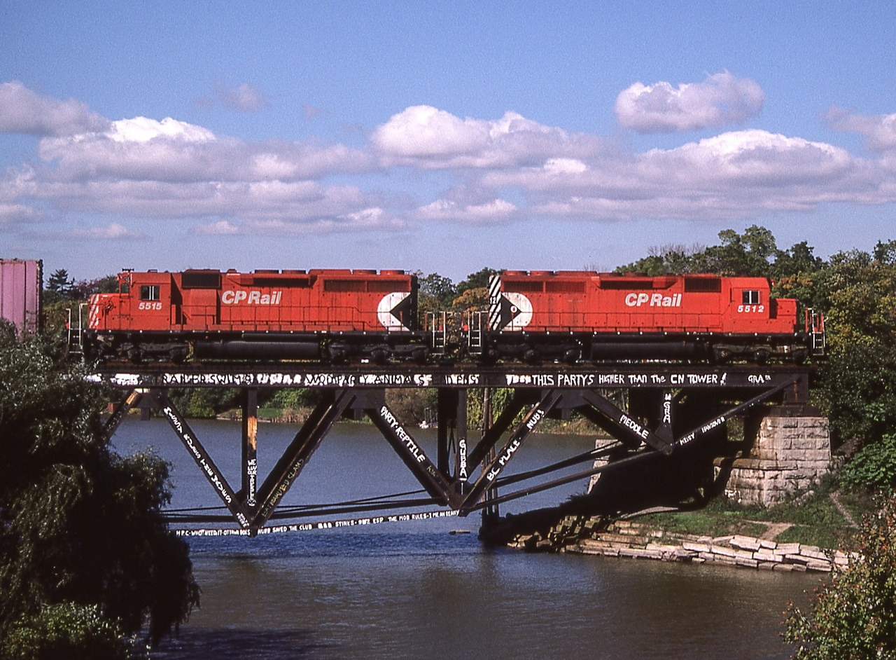 CP 5512 is eastbound as it crosses the Credit River in Port Credit, Ontario on October 10, 1986.