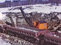 In work service, loading rock at mile 765 on the BCR Fort Saint John sub. We will dump the rock to stabilize the footings of the Blueberry River bridge at mile 771.4. This location is now on the Fort Nelson sub account changes in the employee time table and crew assignments.
The North West shovel was quite the machine, all done with cables, pulleys and an assortment of levers and foot pedals. Truly was operated by an "operating engineer", no computer aided joy stick hydraulics on this machine.

I was not able to locate this location on the map.