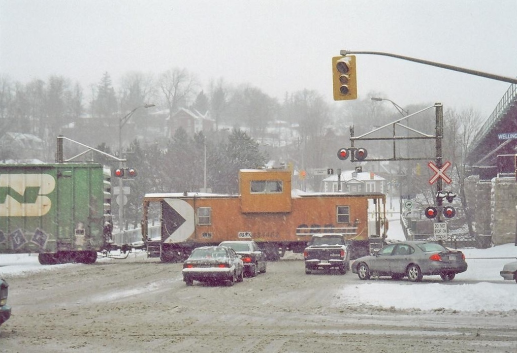 Going back over 14 years ago, I captured this image with the tailend of an OSR train heading up the Guelph Jct. Railway in Guelph, ON. An ex-CP van brings up the rear on a snowy day in 2005.