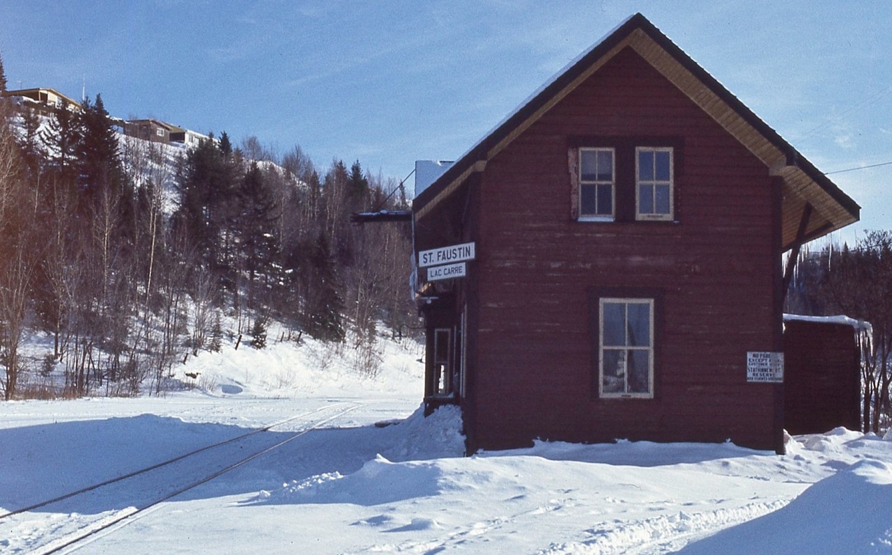 Trying to find active, in service branchline railway stations, even in the seventies, was a challenge. 


On my travels was fortunate to witness the still active CP Rail Ste.Agathe Subdivision.


CP Rail St.Faustin mile 57.0 Ste. Agathe Subdivision


Serviced six times per week by CP Rail Dayliner trains #164 (Tue Thur) #167 (M W F) & #172 (Sun), 


(Dayliner: CPR 's term for Rail Diesel Cars aka Budd Cars),


At this time CP Rail  freight service was tri weekly with power typically either MLW RS10 and / or  RS18,


Last VIA Rail Passenger service: Nov 1981


By 1987 freight service was intermittent as carloads were 14 for the whole year.


The CP Rail Ste. Agathe Subdivision from Ste. Agathe mile 44.4 northward officially abandoned December 1989 ( Ste Therese mile zero ) 
 

December 1976 Kodak Ektachrome at St.Faustin P.Q.  by S.Danko 


what's interesting: 


In 1897, the Canadian Pacific Railway Company purchased the line from St. Jérôme to Labelle from the Montreal Northern Colonization Railway Company.


The railway line from Labelle to Mont-Laurier was constructed by La Compagnie de Chemin de Fer de Colonisation du Nord. The line was completed and opened for traffic between 1902 and 1909. The Canadian Pacific Railway Company leased the line for 99 years on January 1, 1905 


Only two private shippers ( businesses) opposed the abandonment application, along with a multitude of public entities and private individuals, notable: Ville du Montreal, Hydro Quebec, Municipalite de Labelle, Ministry of Transport Quebec, Transport 2000 .


   Petitt Train du Nord circa 1979