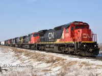 A rather large lash up on 394 with CN 2029, CN 2575, GECX 7349, IC 2707, CN 5409 and CN 5404 as pass east through Wyoming, ON., on a very frosty morning.