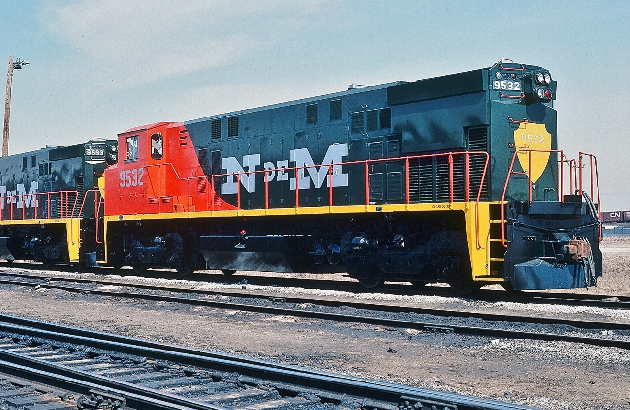 Bombardier (BBD ) built Nacionales de Mexico M424W #9532 part of order #6114 for 53 units including 9527, #9526, and 9533 (& others) in this March 1981 shipment. 


This sharp red-black-yellow paint scheme did not last, most units repainted two tone blue. Anyone know if some N de M M424's operational today? 


CN Mac Yard. March 22, 1981, Kodachrome by S. Danko 


More N de M :


  Builders' plate  


   Builders' service bulletin plate  


   #9549 June '81 image by Ron Bouwhuis'  


        NdM #9526  


 sdfourty