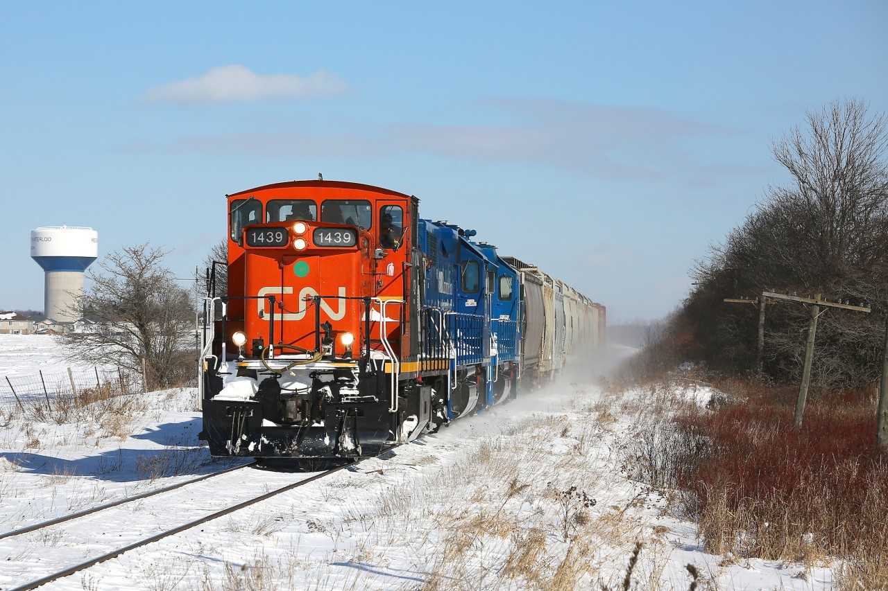 I caught this GMD-1 led local east of New Hamburg as it made its way westwards.  Seeing them open the throttle between the Hwy 7/8 overpass and Stratford was something special to watch.
