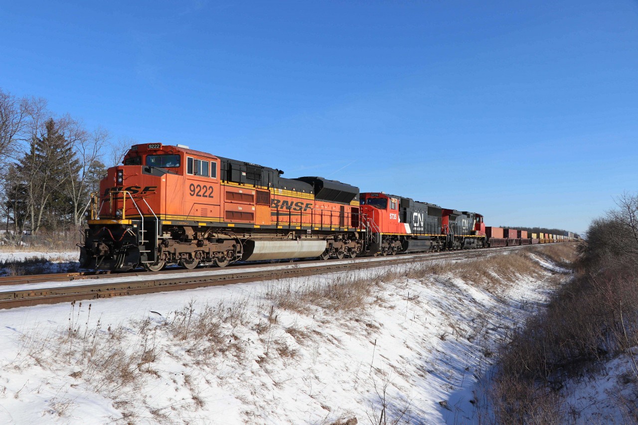 And here is Saturday's "catch of the day"--CN 148 led by BNSF 9222 with CN 5735 and IC 2702.