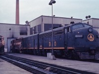 In the late 1960s and early 1970s, Canadian Pacific had a large leased fleet which included F7s from the Baltimore and Ohio and SDs from the Duluth, Missabe and Iron Range (as well as units from the Boston & Maine and Precision National). Here we see three leased units outside of the shop building at Toronto yard in late winter 1972.