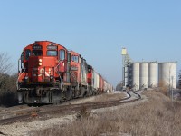CN A431 led by GP9 4131, CN 2409 and a CN wide cab GP unit begin to switch at Shantz Station in Breslau, ON on a sunny snowless January Friday. This train ran into some trouble further east and thus needed the assistance of 4131 to make the grade. The lighting was great but unfortunately I had to get back to work so couldn't get more shots in Kitchener. Definitely nice to see the return of CN to this line.  