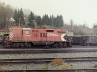 We are going back a few years, but if I remember correctly this picture was taken from the edge of the CPR property. The weather on that day was typical for someone who worked out of the lower mainland. A dull day with "Liquid Sunshine". CP 8812 was working the yard so I just stood there and watched it for awhile, then I photographed it. If you had the proper personal equipment, and a signed release it was easy to carefully photograph the Revelstoke yards. Today Revelstoke is a shell of what it once was, but Golden is happy. For history's sake I'm glad I caught a few of the first generation diesel locomotives. I used to be able to say  that the London built GM locomotives were made just down the street from where I grew up, but I can't say that any more! 