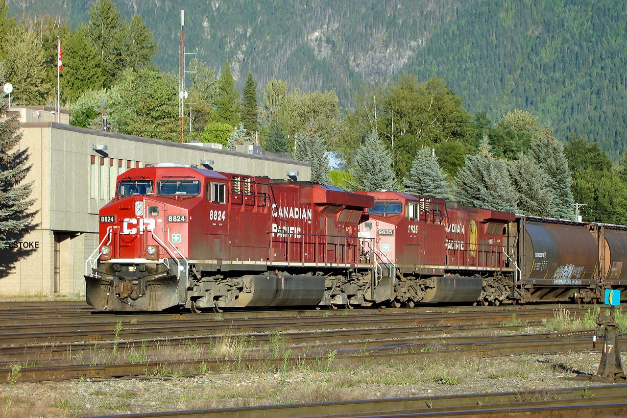 ES44Ac CP 8824 and AC4400CW CP9635 have come of CP's Mountain Sub and pause at Revelstoke for a crew change