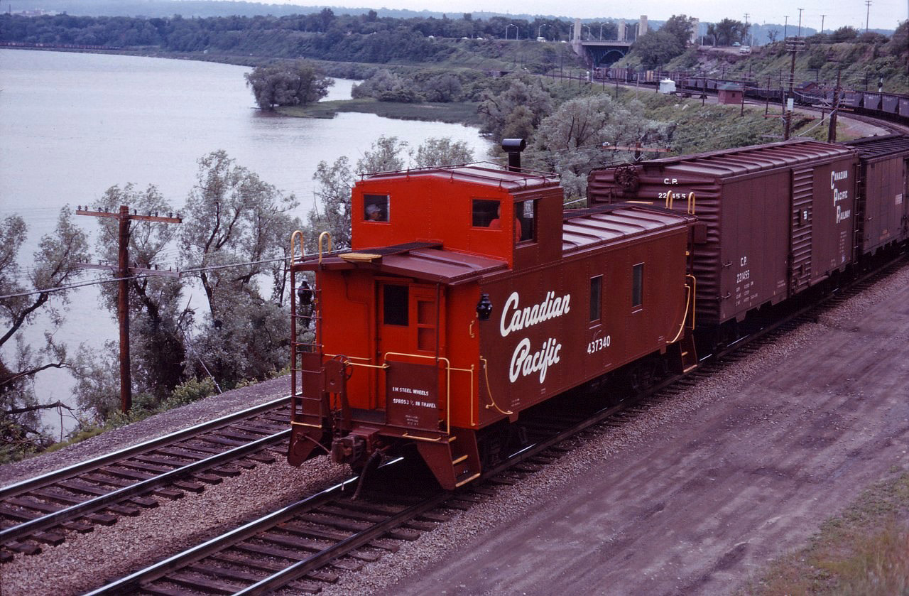 A westbound moves through the plant at Hamilton Jct, returning to CP tracks after exercising trackage rights on the CN Oakville sub "joint section".