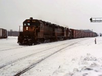 CP 5008 leads another GP35 and an RS3 off of the single track west of "the Junction" into the double track-ABS section of the Galt sub. At the time, the Galt sub was dispatched by timetable and train orders; this is a scheduled train found in the timetable since is is not "displaying signals"
