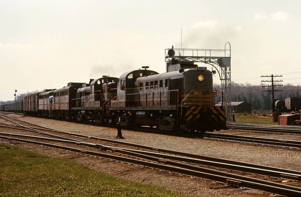 An eastbound rolls through Guelph Jct behind a pair of RS3s and a pair of FA1s. The last unit in the consist is likely off-line, since CP cab units did not have nose-MU capability.