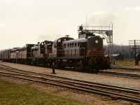 An eastbound rolls through Guelph Jct behind a pair of RS3s and a pair of FA1s. The last unit in the consist is likely off-line, since CP cab units did not have nose-MU capability.