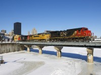 A late CN 149 is exiting the Port of Montreal with CN 2106, GECX 9124, CN 2502 and 188 platforms. Both of the first two units are ex-UP, with CN 2106 formerly being UP 9071 (built as CNW 8559) and GECX 9124 (still in UP paint) was formerly UP 9385.