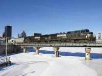 CN X527 with NS 9124 & NS 9115 for power shoves into the Port of Montreal with a cut of cars that are actually destined for Taschereau Yard. The cars will be coupled to their port cars and then they can head straight to Taschereau Yard without having to switch in cramped Pointe St-Charles Yard, which would involve blocking a couple of crossings.