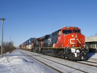 CN 2962 and CN 3012 are the power on CN X106 as it heads east through Dorval.