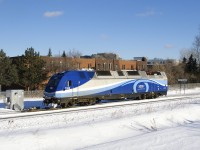 On a portion of track that normally sees no AMT power or trains, AMT 1359 is westbound, heading from the Pointe St-Charles Maintenance Centre to Taschereau Yard, and likely Sortin Yard after that