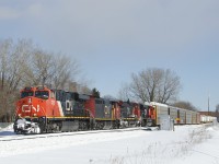 CN 305 has CN 2228, CN 2429, CN 2135, CN 8000 and 128 cars as it passes through St-Henri later than it usually does.