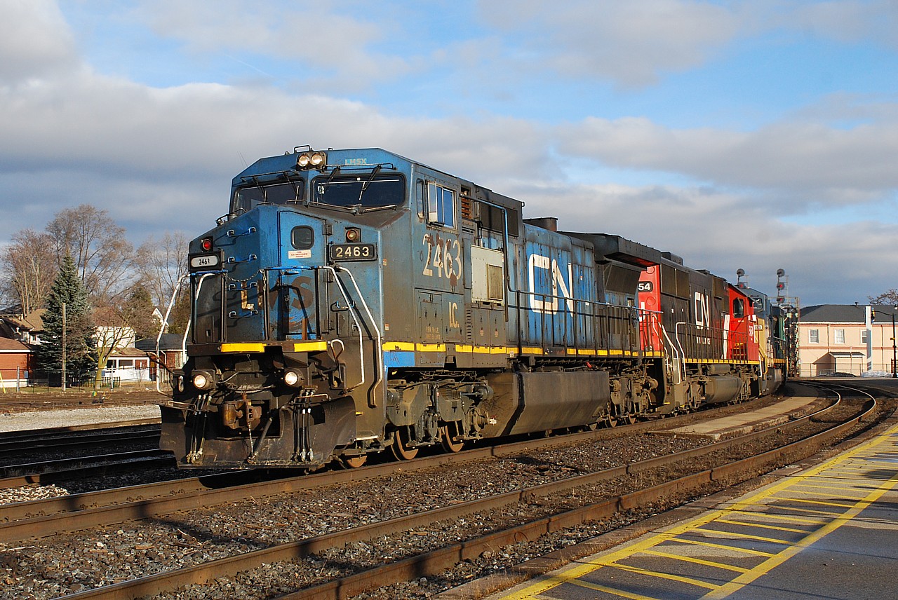 The clouds parted just in time to let the sun shine down on all the beauty(!) that is IC 2463.  The train would soon slow to a stop to allow 331 to complete crossing over ahead of them at Hardy, allowing 148 to continue eastbound on the south track.  It was a hoppin' 20 minutes in Brantford.
