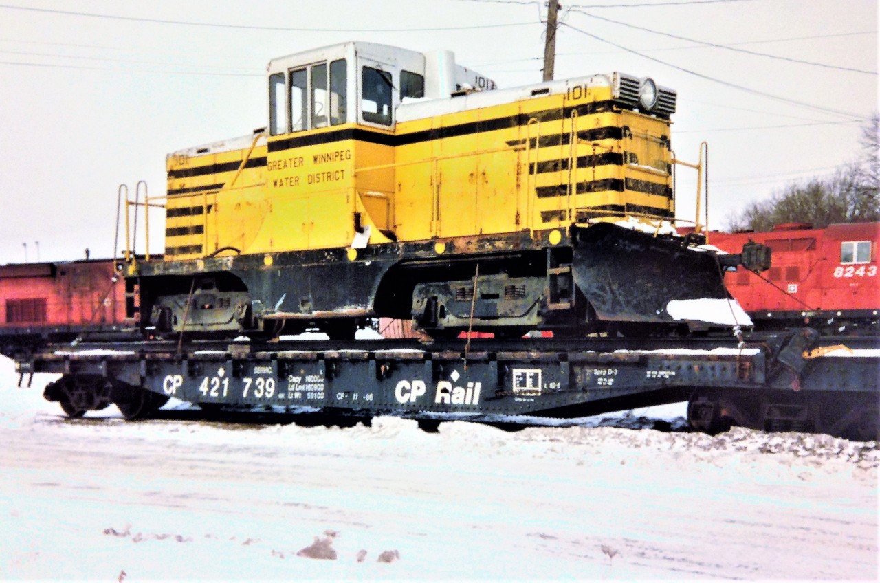 Former Greater Winnipeg Water District (GWWD) GE 44-tonner 101 is seen in CP's Quebec Street yard in London, Ontario on February 5, 1994 having just arrived from Manitoba. During 1994 the Ontario Southland Railway (OSR) had acquired four GE 44-tonners from GWWD, which were numbered 100-103. Units 100 and 101 were sent for switching duties to W.G. Thompson & Sons large elevators at Blenheim and Rodney, Ontario while sister 103 was acquired by the Port Stanley Terminal Railway while 102 was retained as a parts supply. Both 100 and 101 were eventually sold by OSR to W.G. Thompson & Sons during August 1997. Photo by Carl Noe