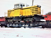 Former Greater Winnipeg Water District (GWWD) GE 44-tonner 101 is seen in CP's Quebec Street yard in London, Ontario on February 5, 1994 having just arrived from Manitoba. During 1994 the Ontario Southland Railway (OSR) had acquired four GE 44-tonners from GWWD, which were numbered 100-103. Units 100 and 101 were sent for switching duties to W.G. Thompson & Sons large elevators at Blenheim and Rodney, Ontario while sister 103 was acquired by the Port Stanley Terminal Railway while 102 was retained as a parts supply. Both 100 and 101 were eventually sold by OSR to W.G. Thompson & Sons during August 1997. Photo by Carl Noe