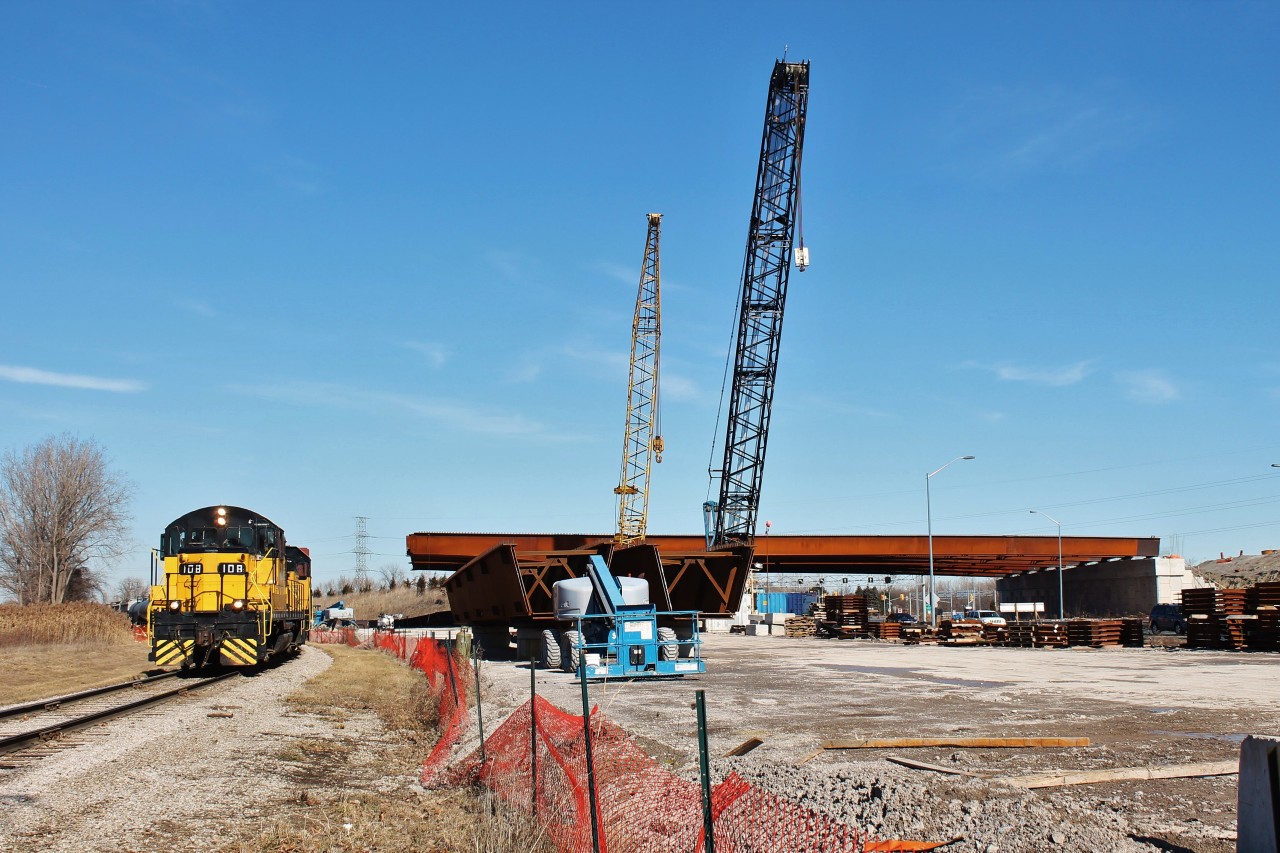 An ETR job passes the construction for the Gordie Howe International Bridge on the northern end of Ojibway Yard. This is the overpass over Ojibway Parkway that will connect the 401 to the bridge's toll/customs plaza and the Duty Free Store. I'm looking forward to photographing this area over the next few years to document the transition.