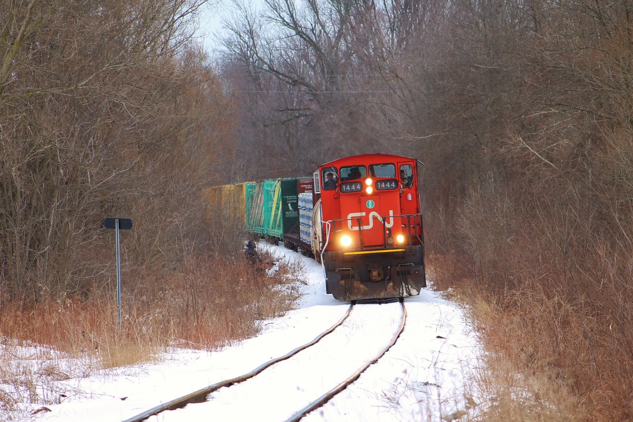 CN L542 passes through a wooded area on the south side of Guelph as they make their way towards Guelph Junction and XV Yard. Believe it or not this day was my first time shooting a GMD1 ever and I enjoyed every moment being around its presence.