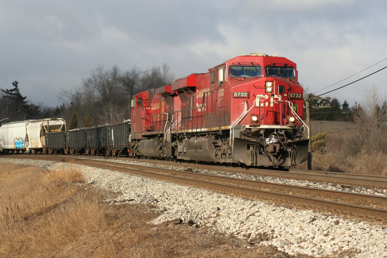 Under a break in the clouds, CP train 234 is just east of Campbellville, as it heads down the Niagara Escarpment for Agincourt yard in Toronto with 8732 and 9673.