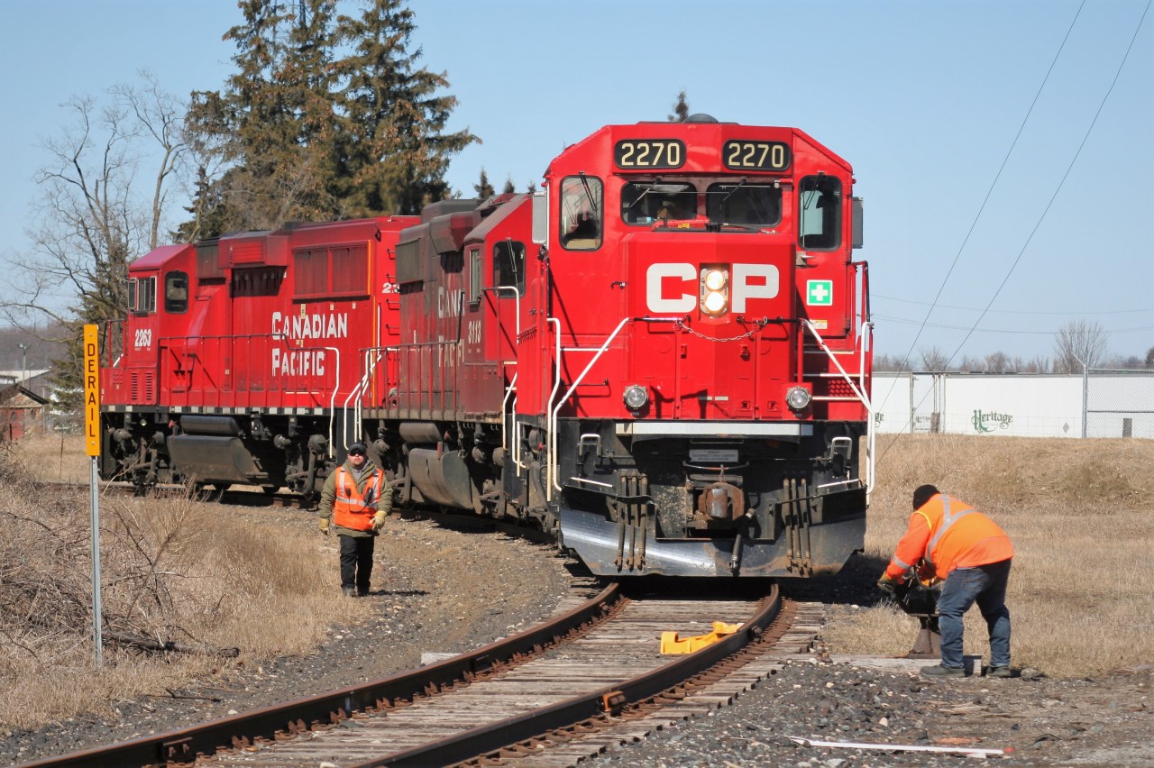 Retreating back to Wolverton, GP20C-ECO 2270, GP38-2 3113 and GP20C-ECO 2263 are seen on the Ayr Pit Spur in Ayr, Ontario during a late winter afternoon. The trio had just returned empty handed after a short run down to the FS Partners/Growmark facilities to lift several awaiting hoppers cars. However, upon arrival they found an unmanned track mobile blocking the hoppers. So with nobody there to move the track mobile they departed light power back up to the Galt Subdivision mainline and to Wolverton yard.
